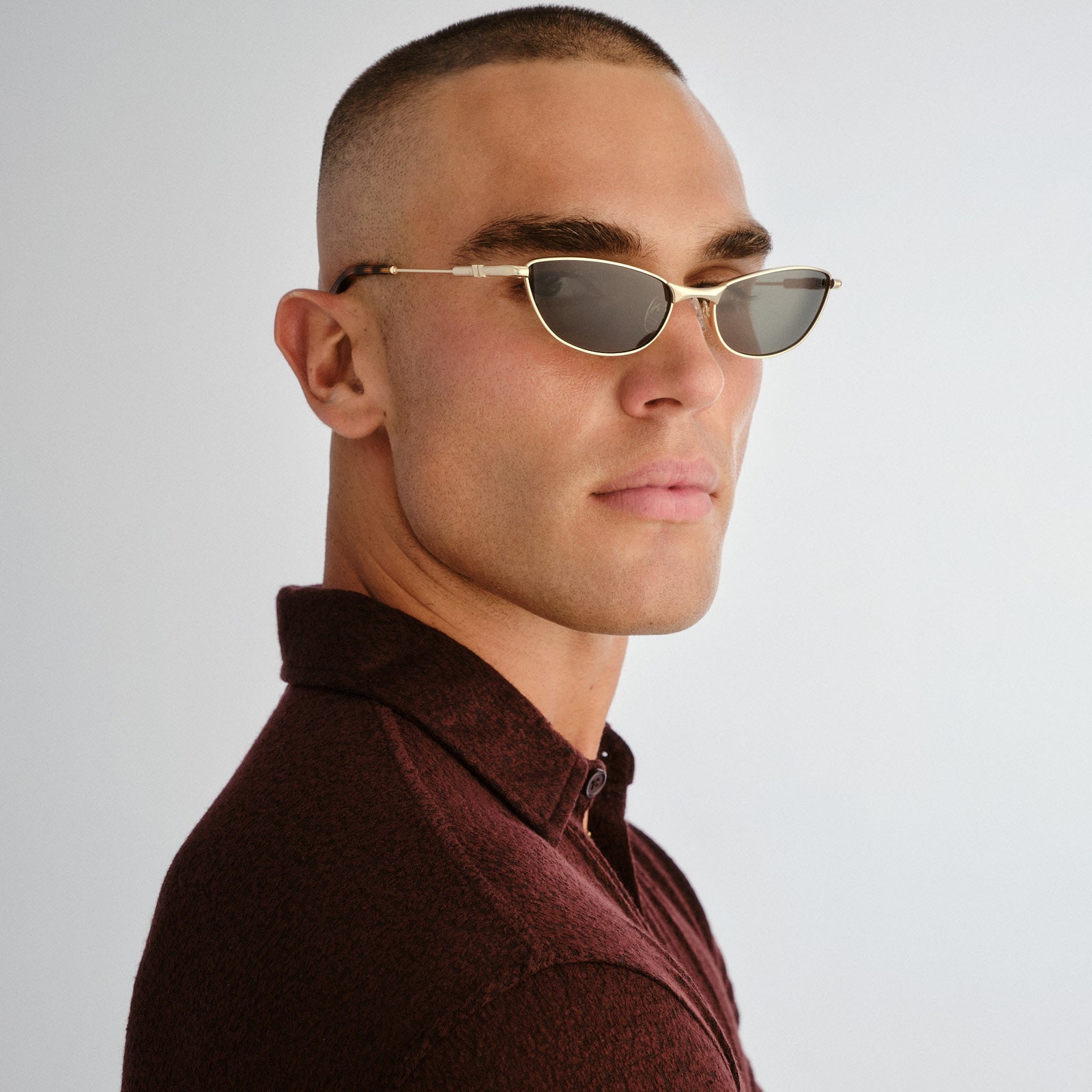 Thorned Gold Uni-Sex Oval Sunglasses | Le Specs