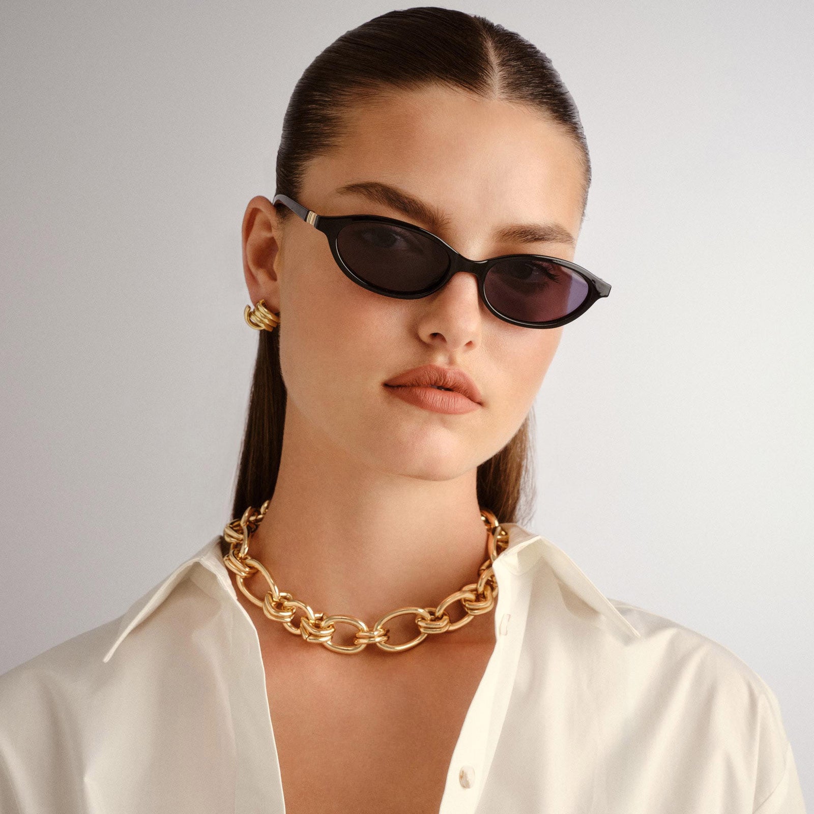 Duskfall Black Female Oval Sunglasses | Le Specs