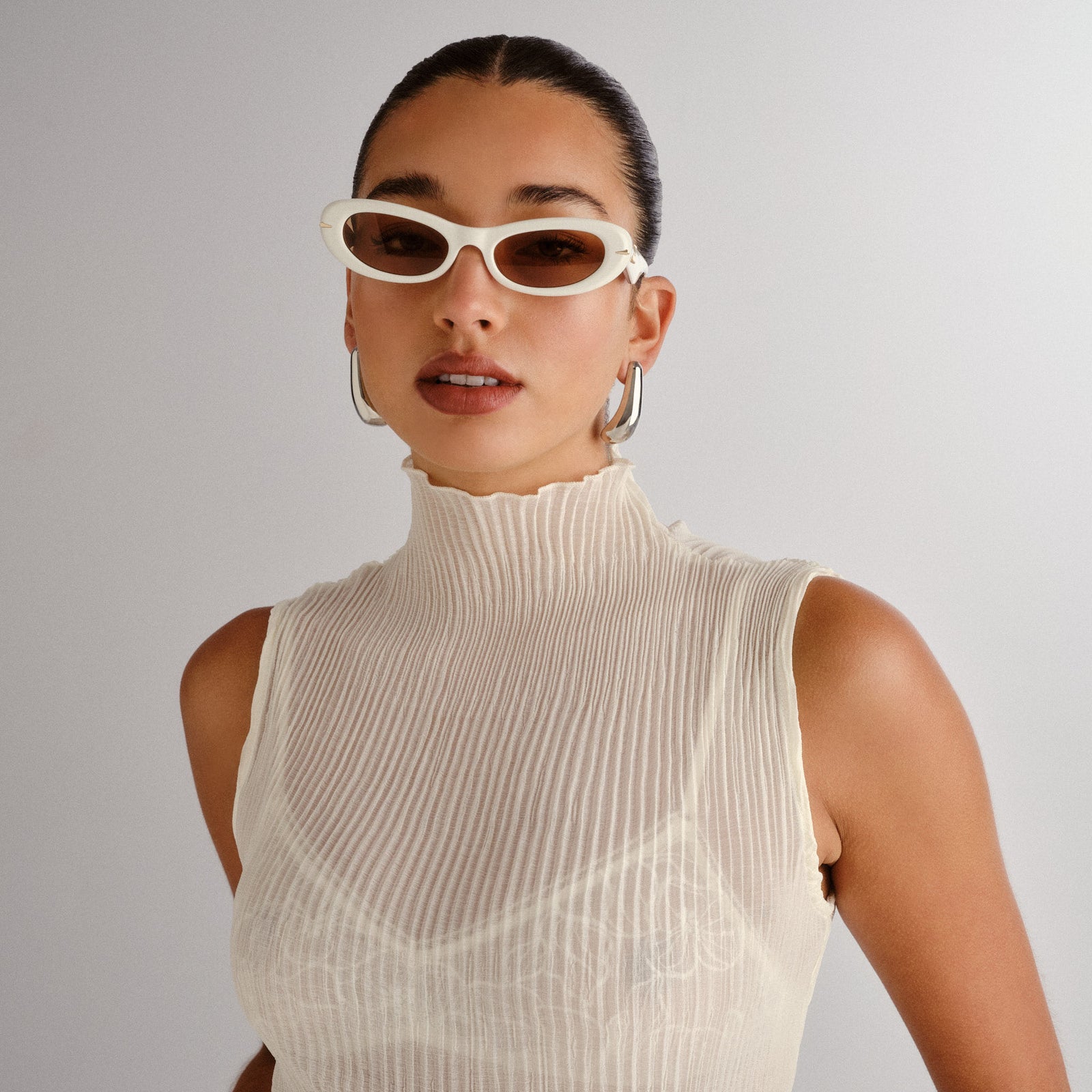 Numero Uno Ivory Female Oval Sunglasses | Le Specs