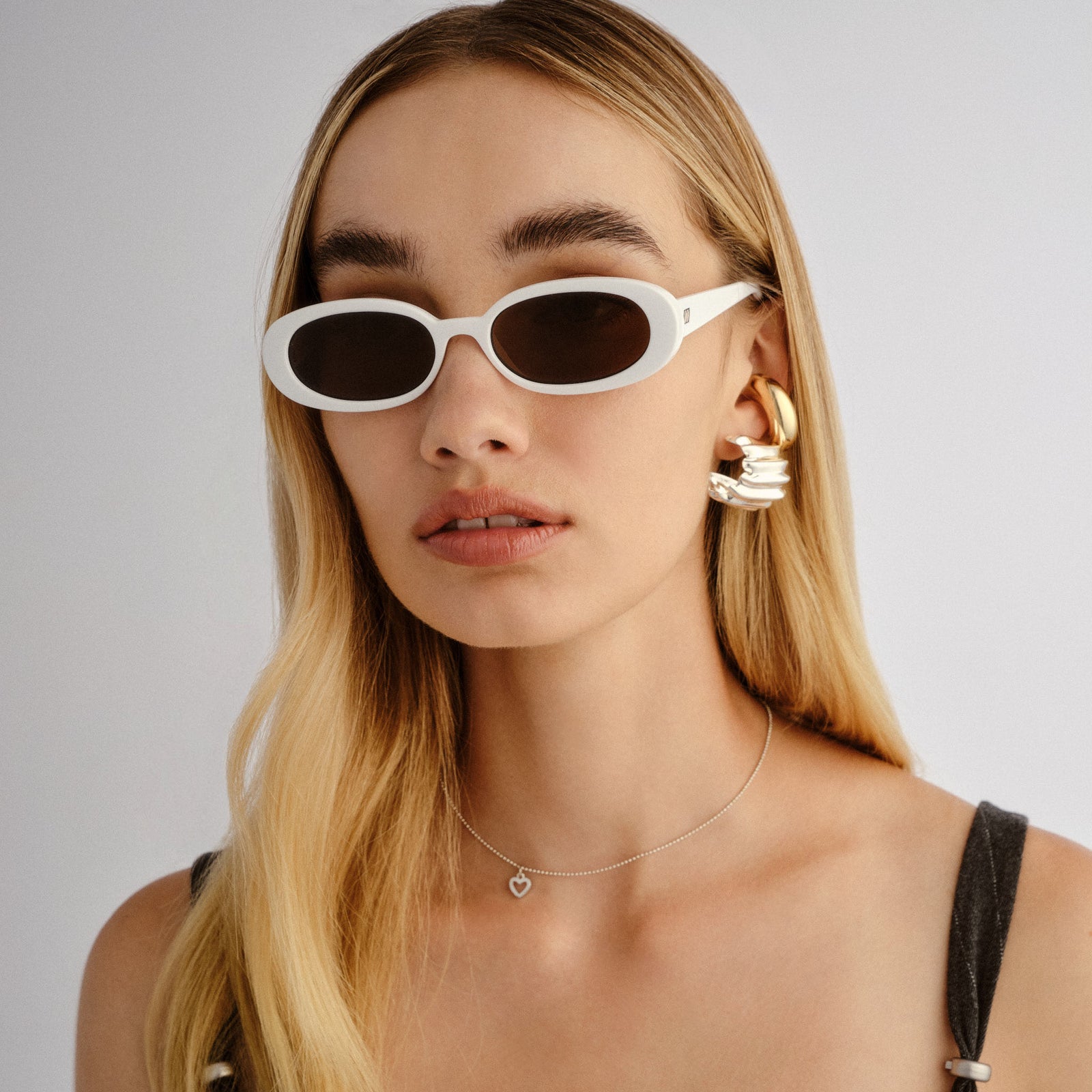 Outta Love White Female Oval Sunglasses | Le Specs