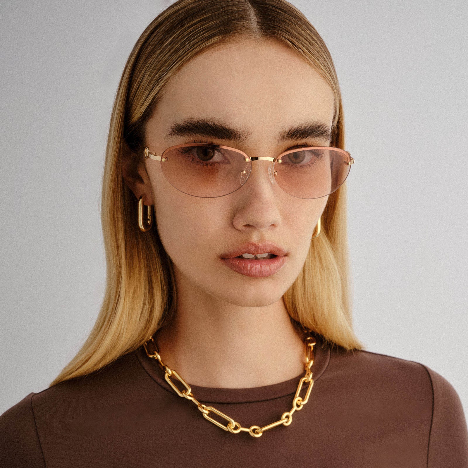 Slinky Gold Female Oval Sunglasses | Le Specs